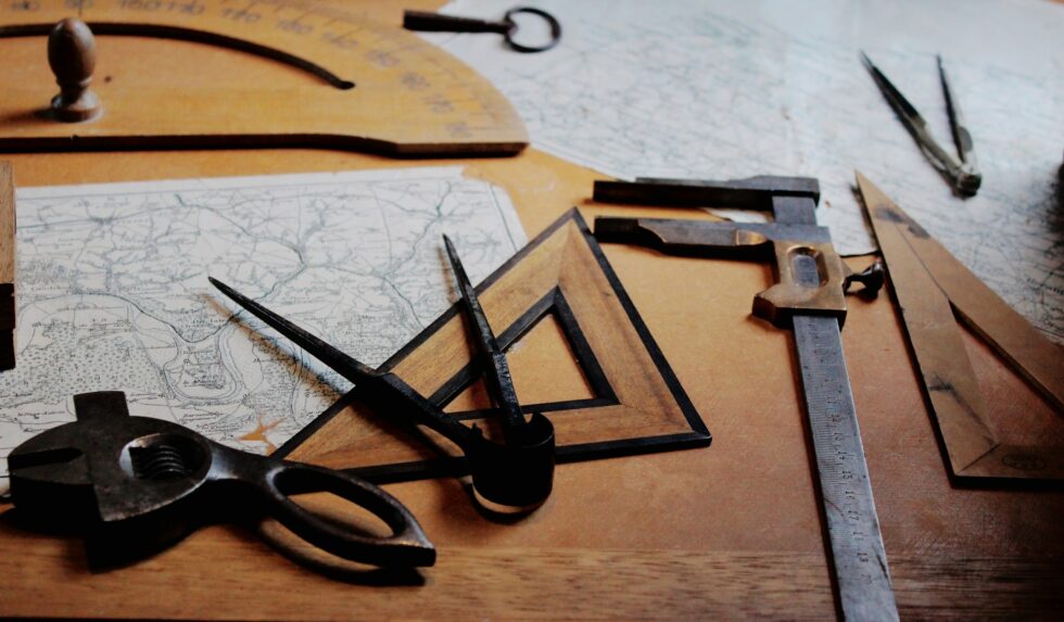 Tools and maps on a worktop