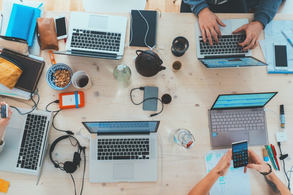 People working collaboratively at their desk