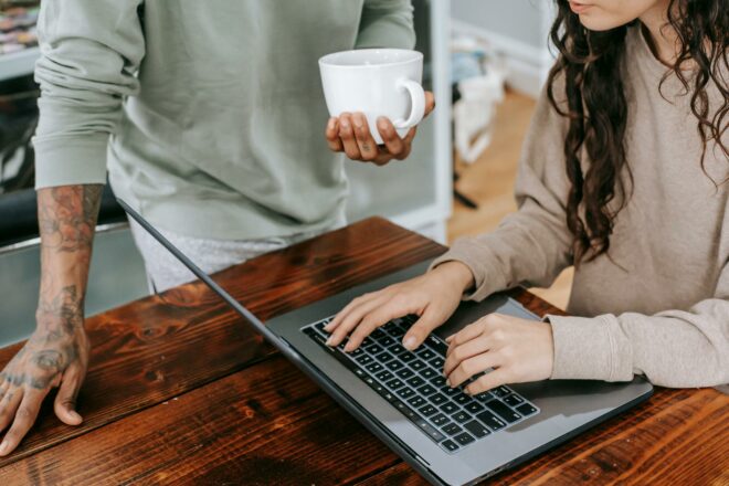 Woman typing on laptop